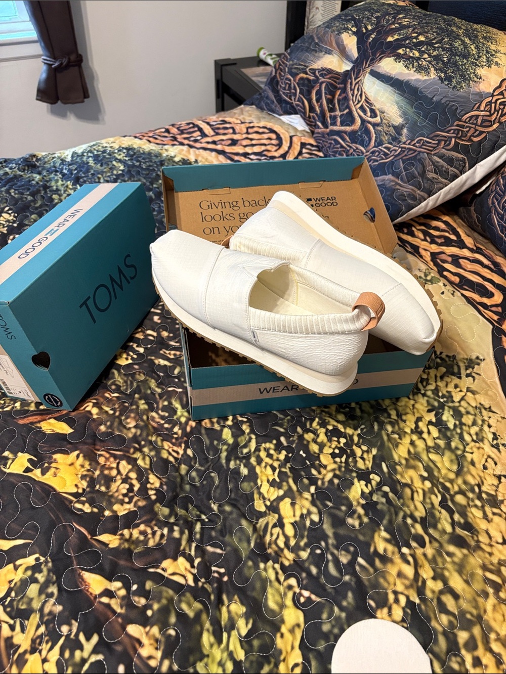 Toms Women's White Canvas Slip-On Flats with Tan Heel Tab